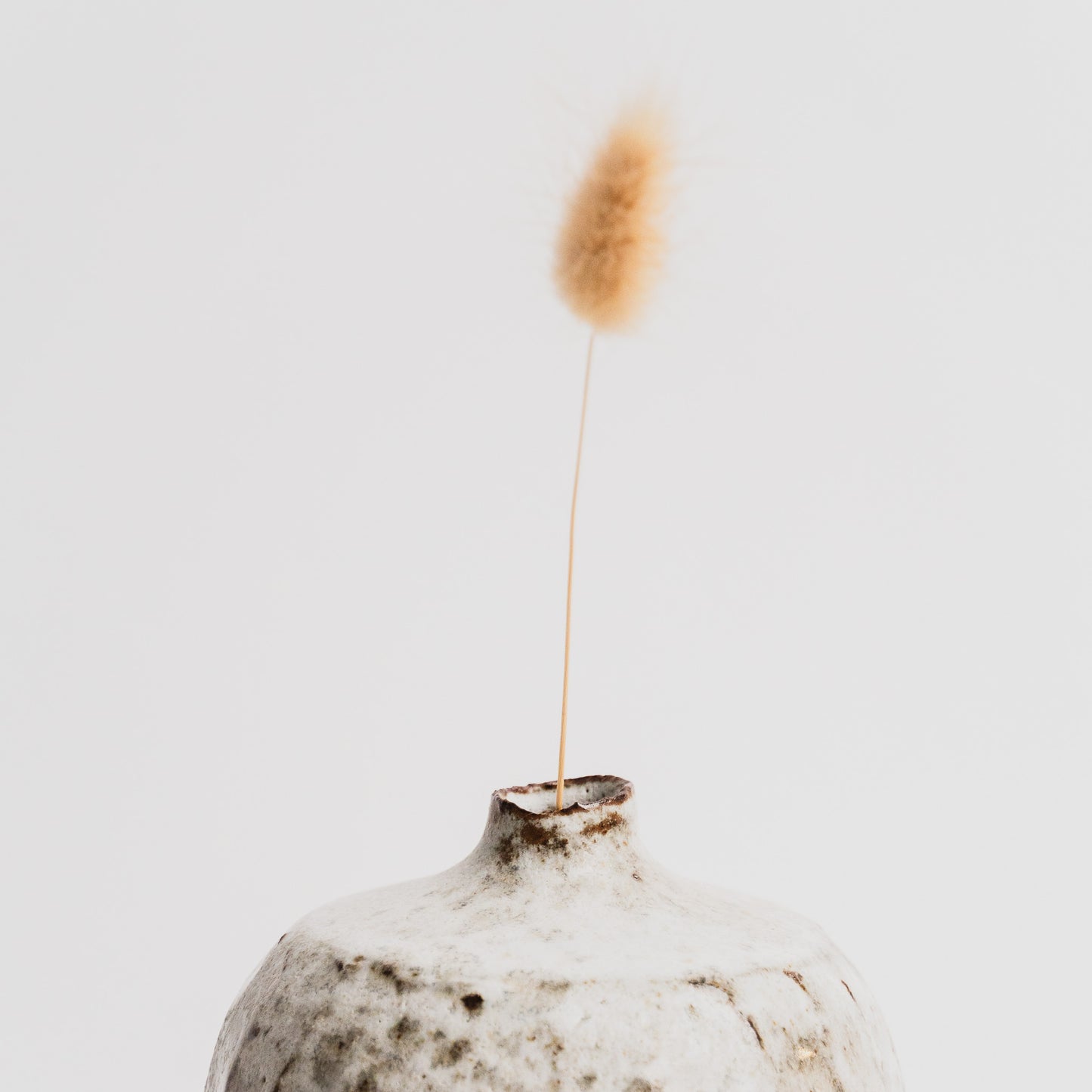 Small bud vase balck volcanic glazing