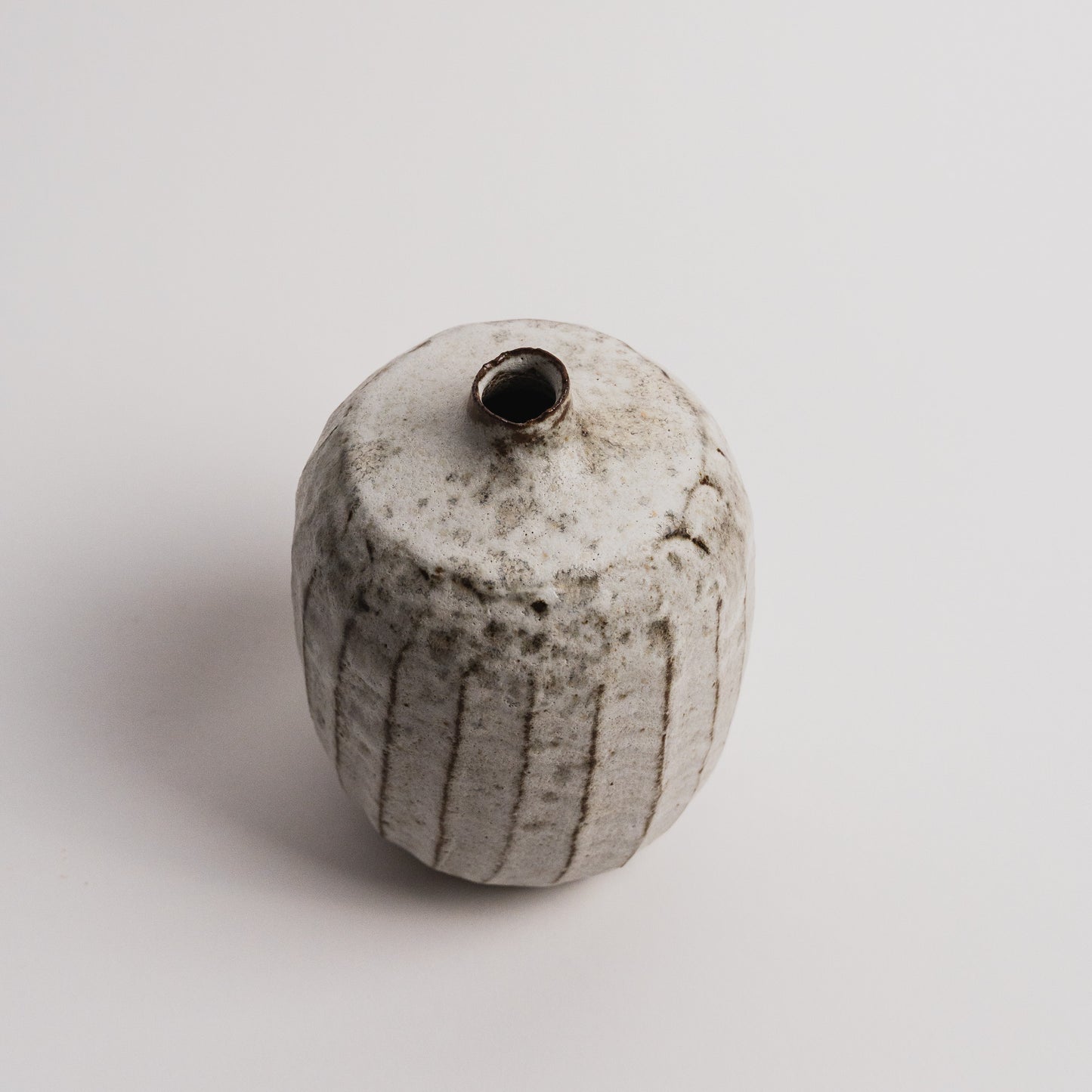 Small bud vase balck volcanic glazing