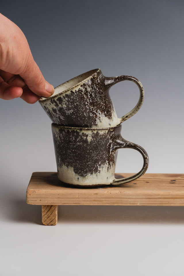 Stoneware cup with a handle - brown glazing tones