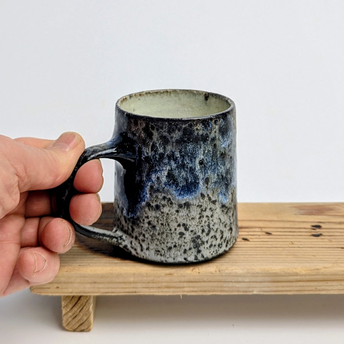 Blue cup with handle