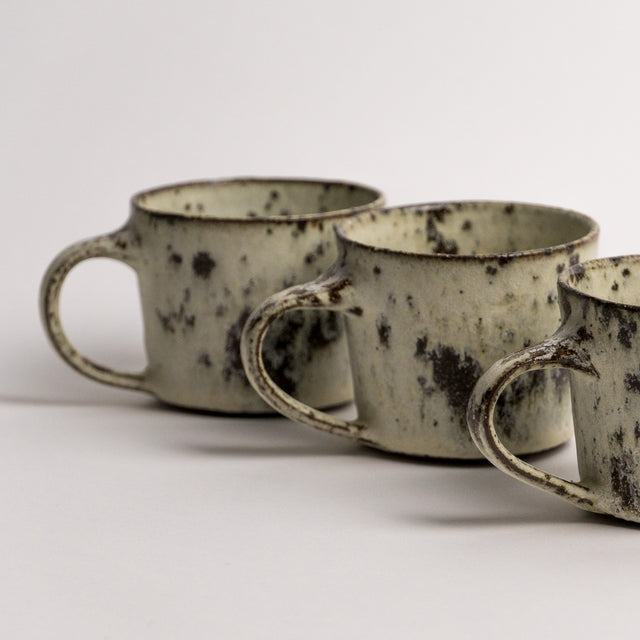 Offwhite cup with handle