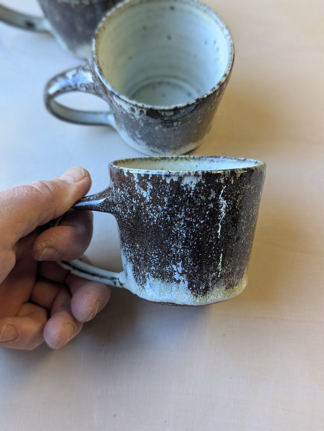 Stoneware cup with a handle