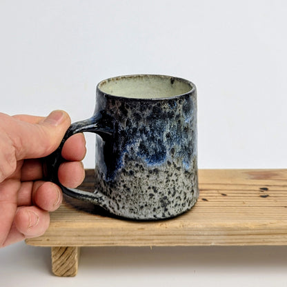 Blue cup with handle