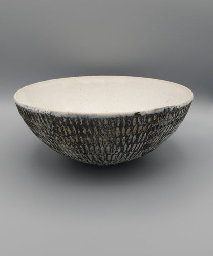Handthrown and carved bowl.